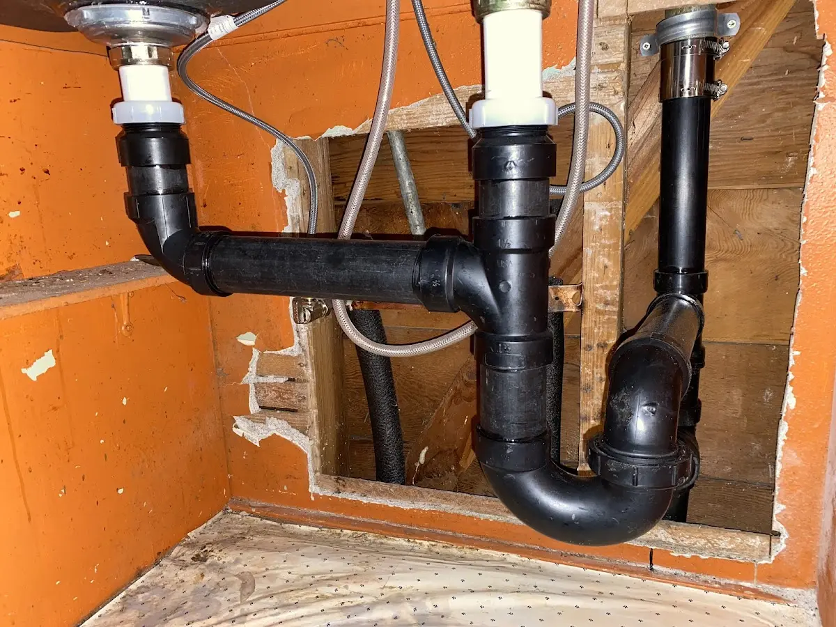 Professional Garbage Disposal Repair equipment and tools on the job in Zebulon